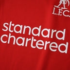 Liverpool 25/26 Home Kids Kit - Standard Chartered sponsor detail