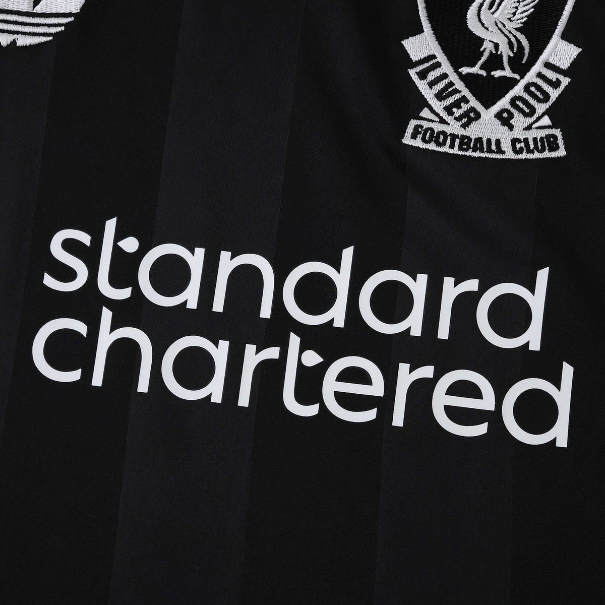 Liverpool 25/26 Goalkeeper Black Jersey - Standard Chartered sponsor detail