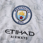 Manchester City 25/26 x KidSuper Jersey - crest and sponsor detail