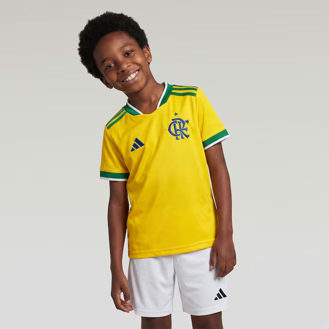 Flamengo 2026 Brazil edition kids kit in yellow with green trim, worn by child model