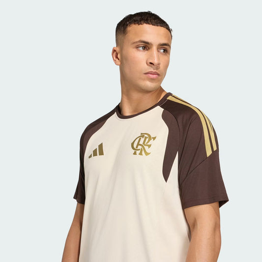 Flamengo 2026 staff jersey in beige with brown raglan sleeves, worn by model