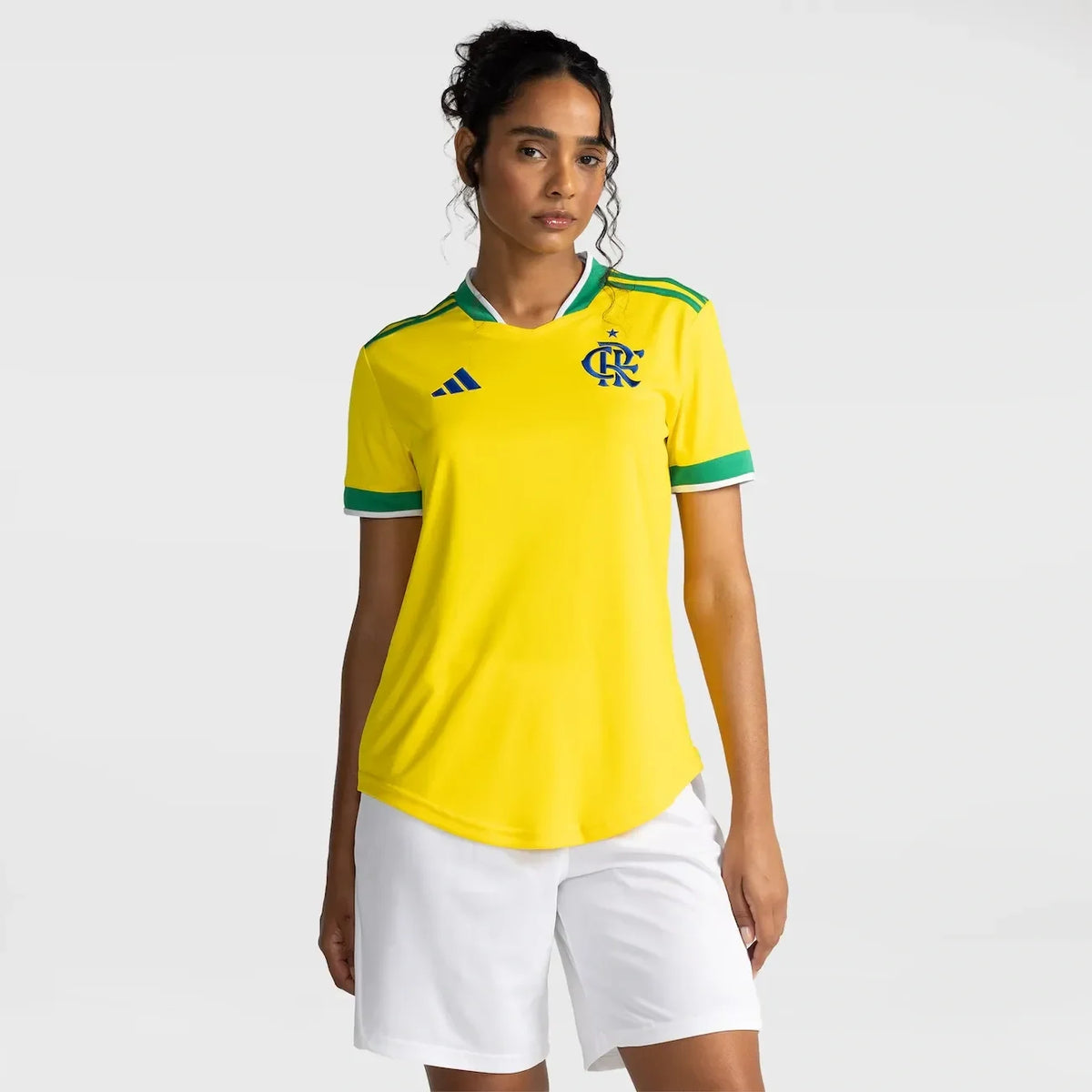 Flamengo 2026 Brazil edition women's jersey in yellow with green trim, worn by model