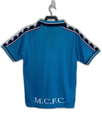 Prima maglia home del Manchester City 97/98 - Versione retro